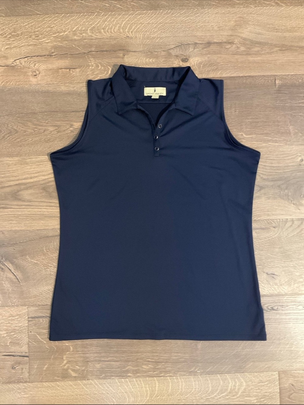 Sport Haley navy sleeveless polo, L